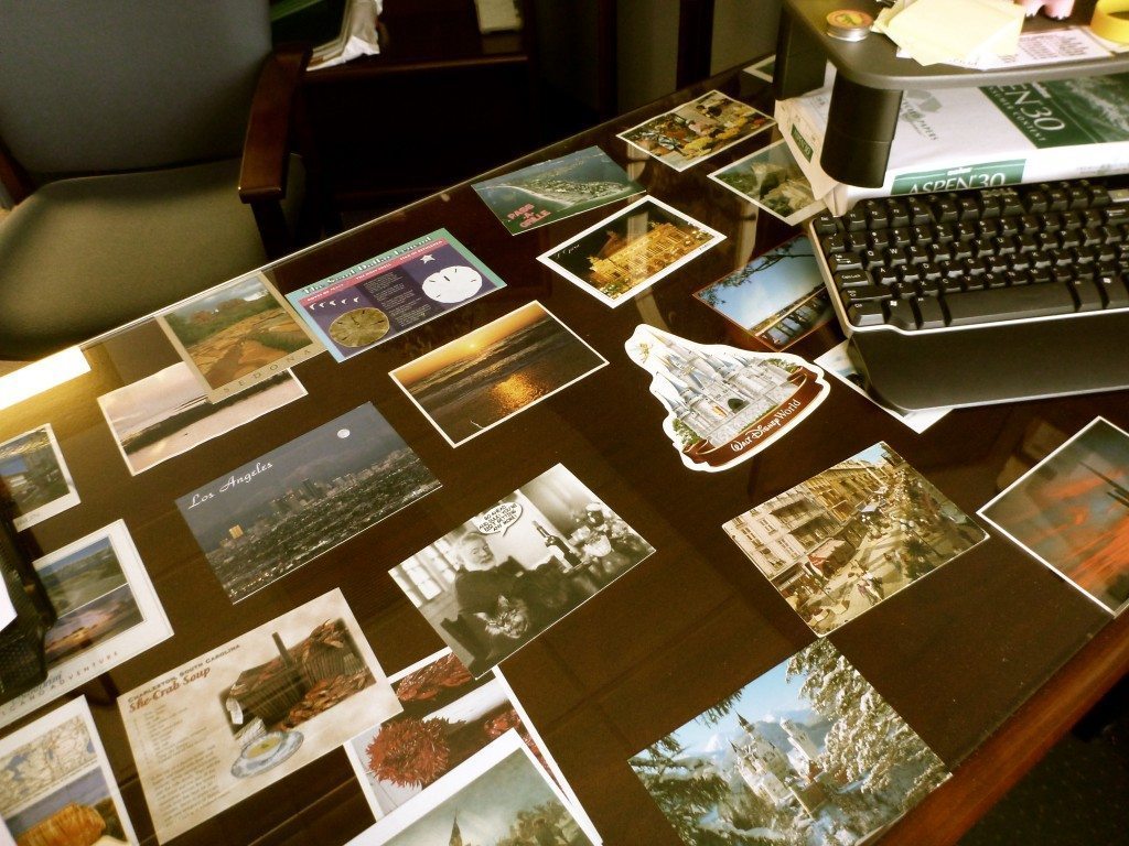 postcards-under-desk-decorating-office