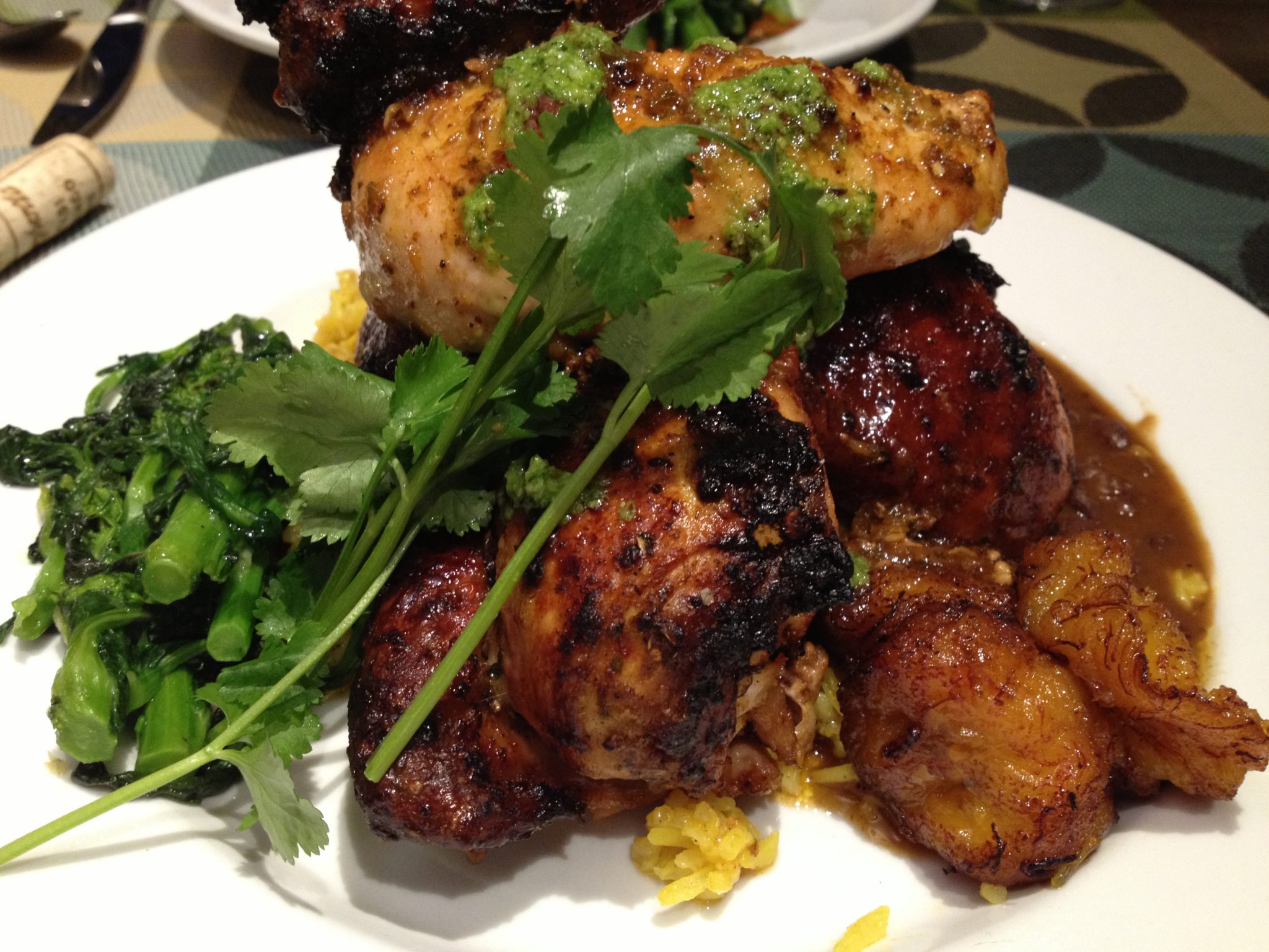 Fragrant marinated Cornish game hen with sweet plantains at Blue Cat