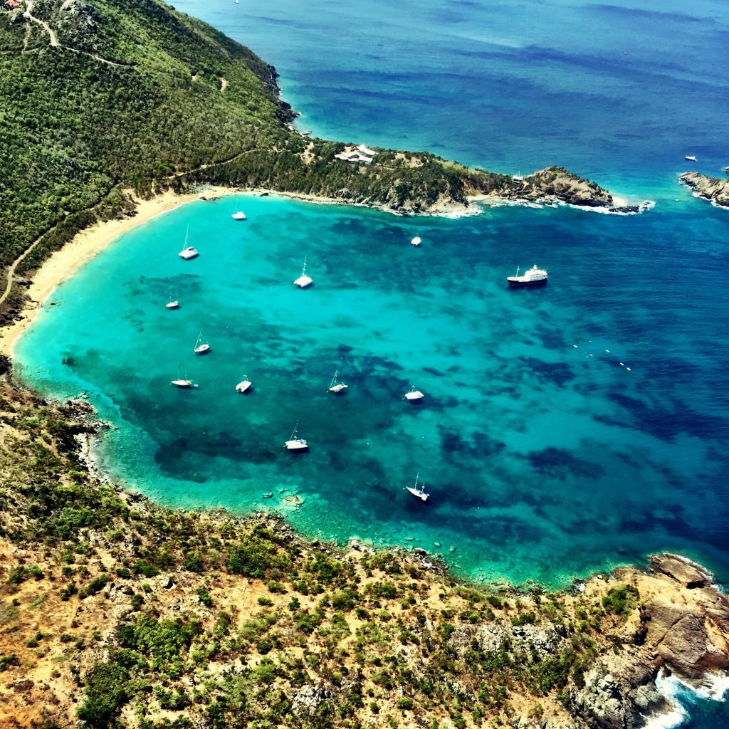 One cure for wanderlust are dreamy beach pictures like this one of Colombier beach.