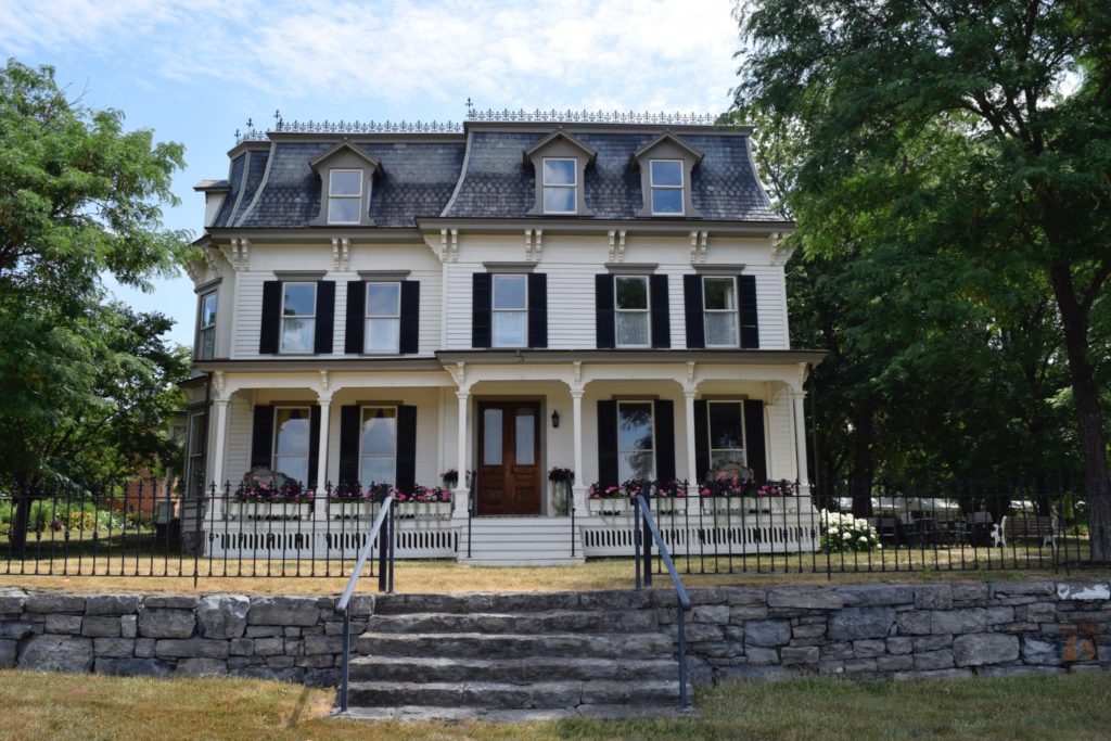 exterior of the Mackenzie-Childs farmhouse, site of the annual Mackenzie-Childs barn sale