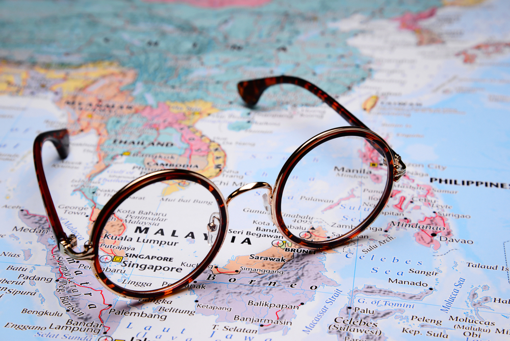 eyeglasses on a map what to do so you don't forget glasses on vacation