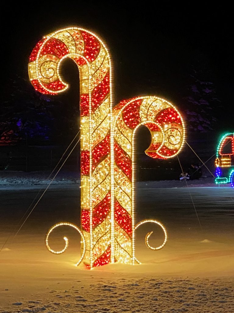 Giant neon candy canes at Bethel Woods Peace Love and Lights drive thru holiday light show