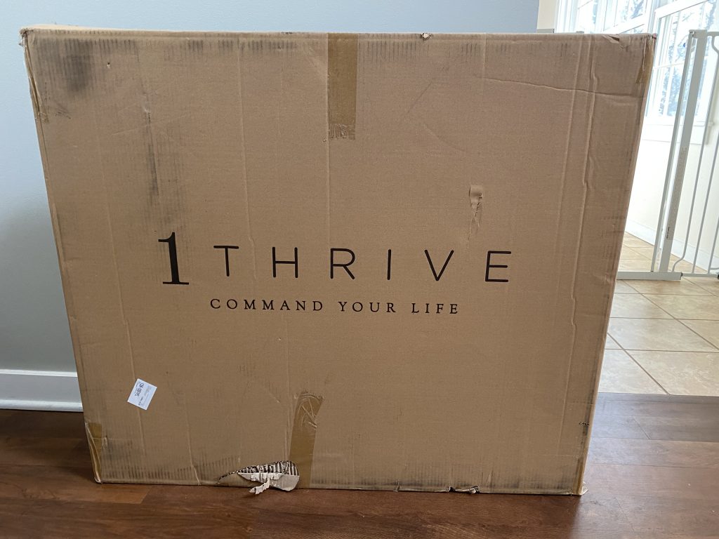 Large cardboard box containing a 1Thrive command center