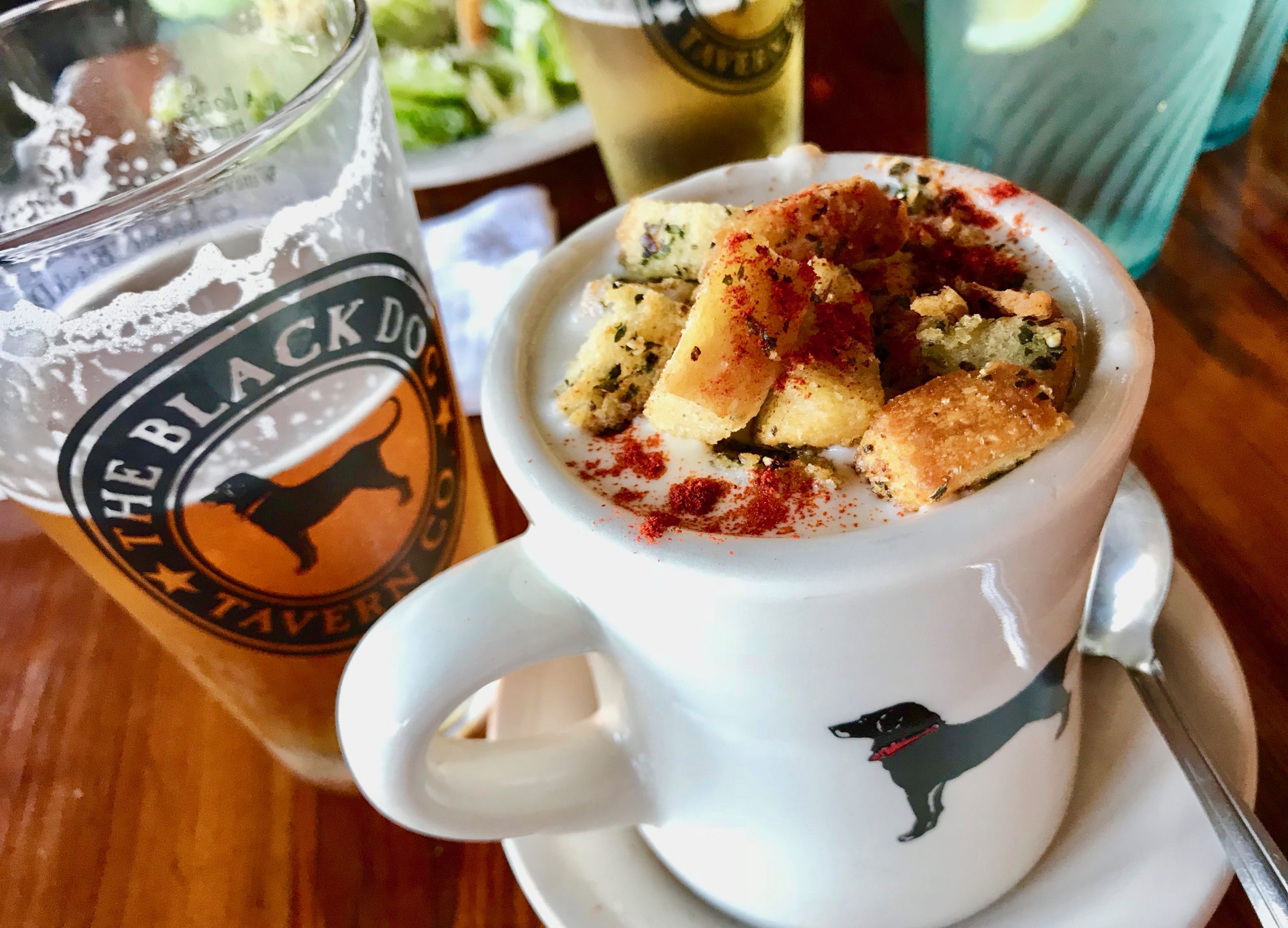 mug of clam chowder and a beer at Martha's Vineyard famous restaurant The Black Dog