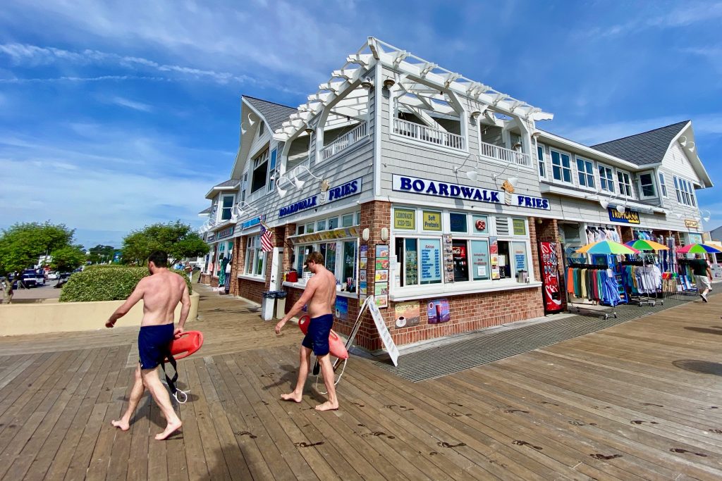 Boardwalk Fries store on the Bethany Beach boardwalk with lifeguards
