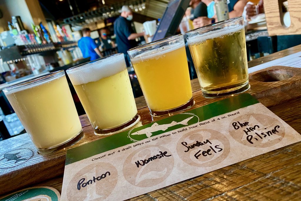 Flight of beers at Dogfish Head Brewery, one of the best things to do in Delaware