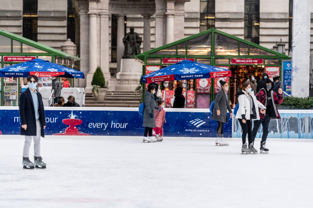 Skaters on the Winter Village ice in Bryant Park in NYC.