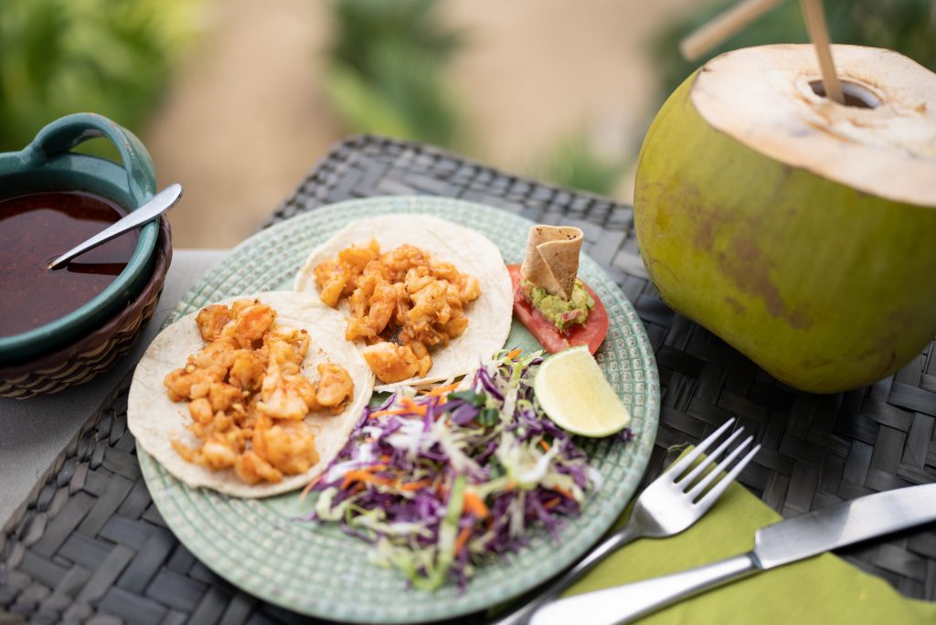 Colorful plate of slaw and street tacos served at ZihFit, a luxury wellness resort in Mexico